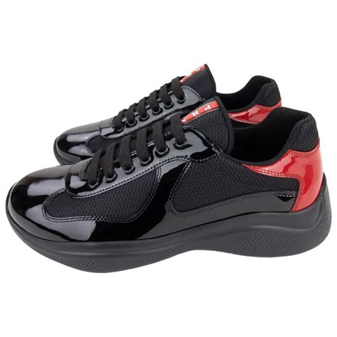 red and black Prada sneakers